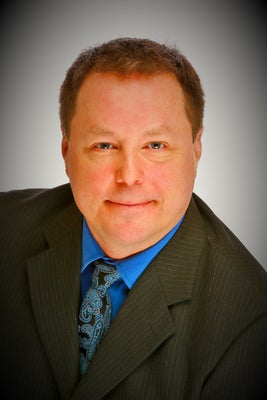 Portrait of Bruce Voigt, REALTOR.